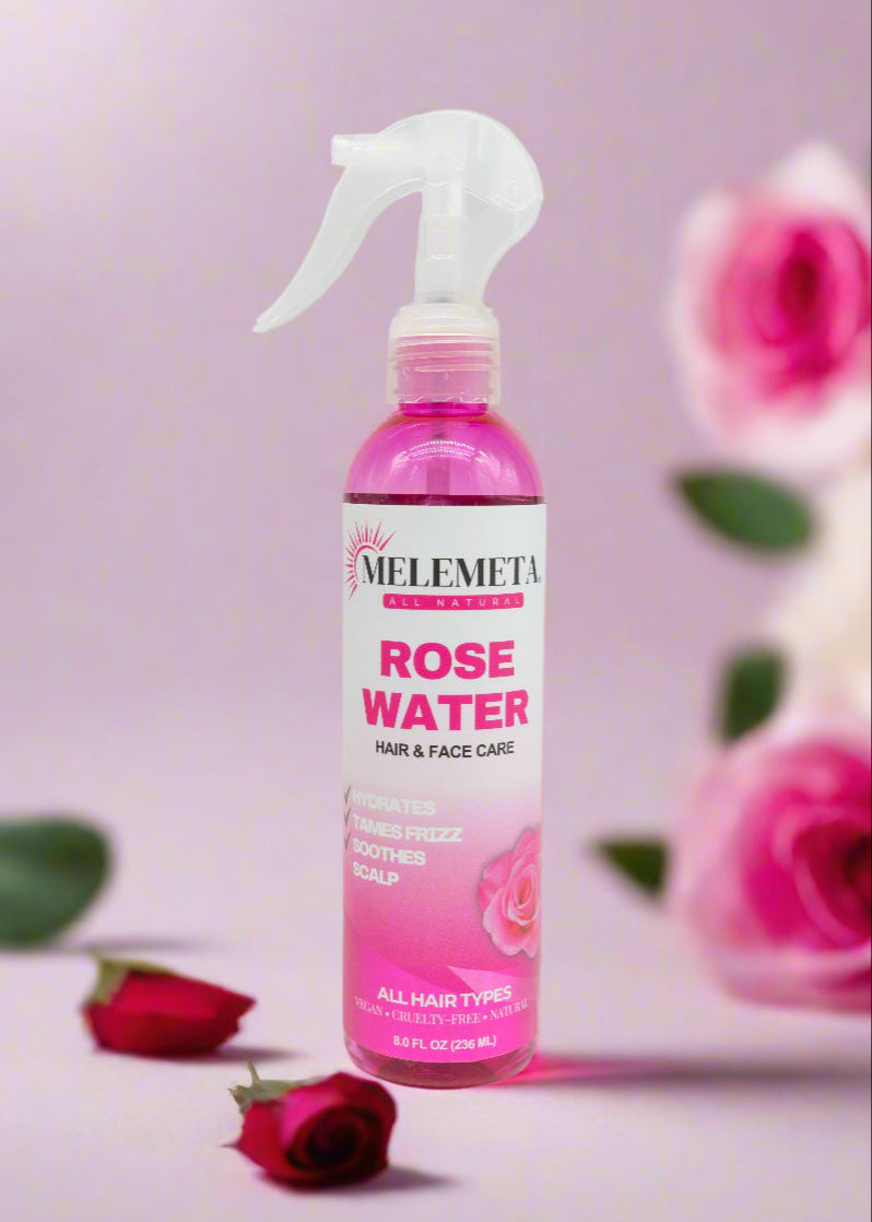 Melemeta Rose Water hair and face care spray bottle with roses in the background